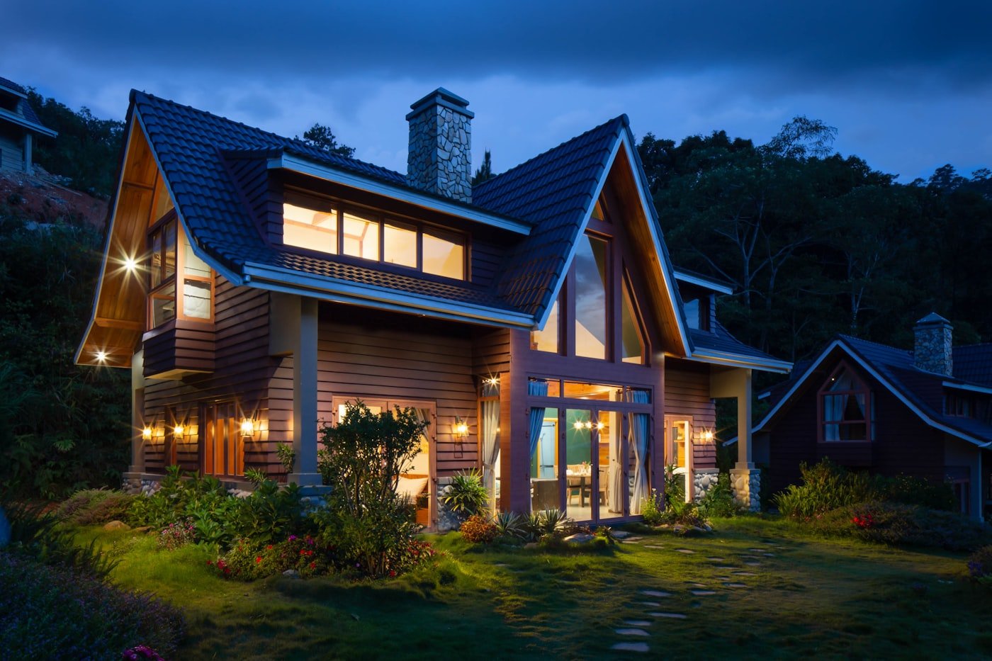 A warmly lit, energy-efficient Midlands home at dusk